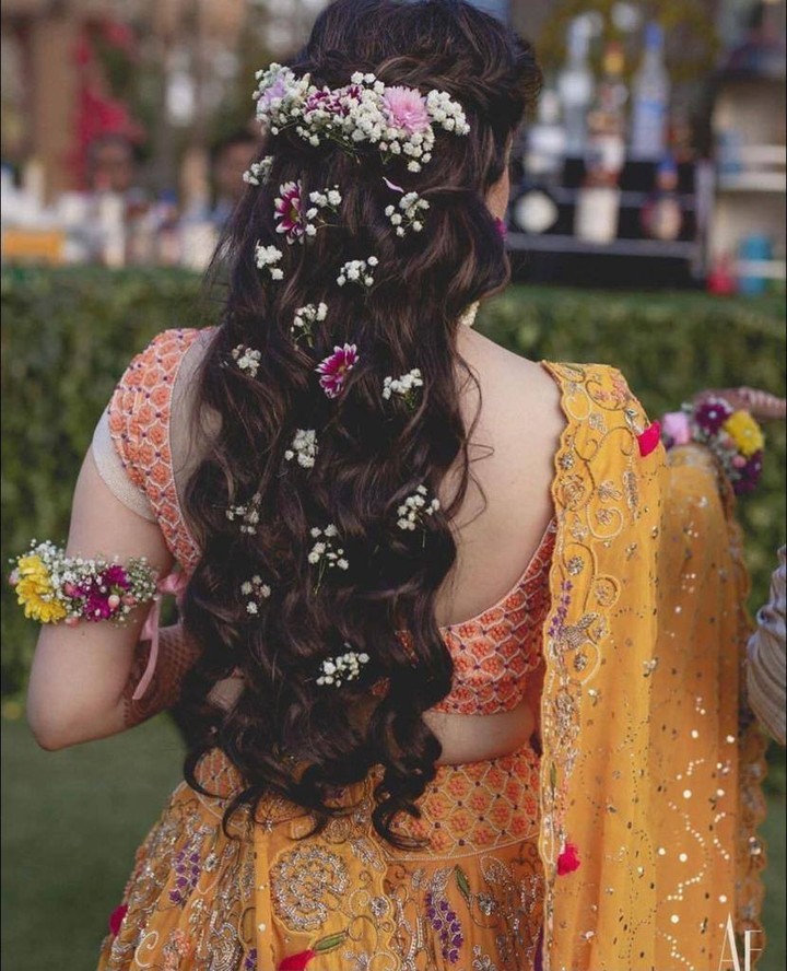 Photo of pretty haldi bridal look with a braided hairstyle