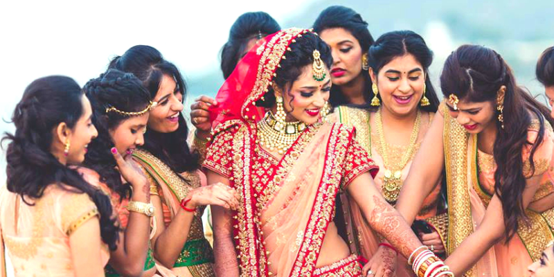 Lovely Indian bride and groom posing funny with bridesmaids capture. |  Photo 167036